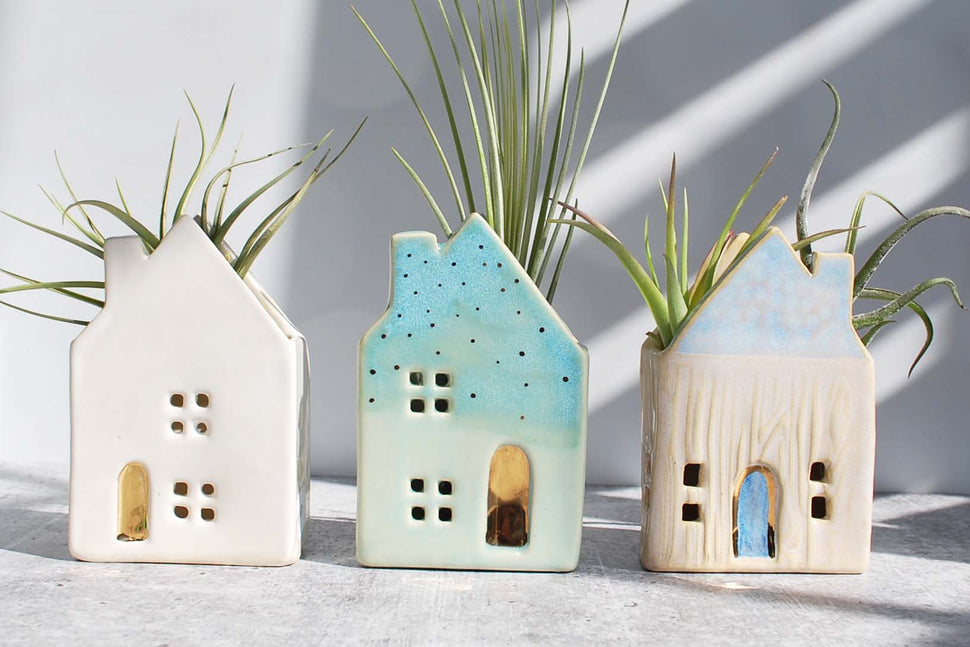 three ceramic houses