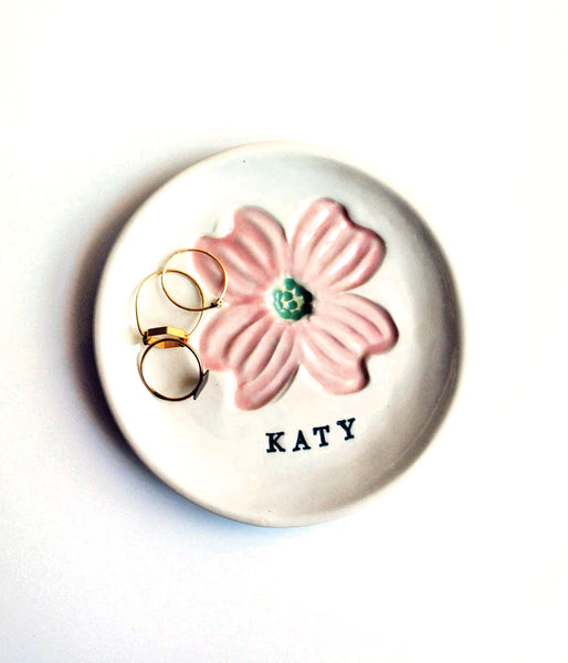 porcelain ring dish with pink dogwood stamped, with personalized name stamped in black