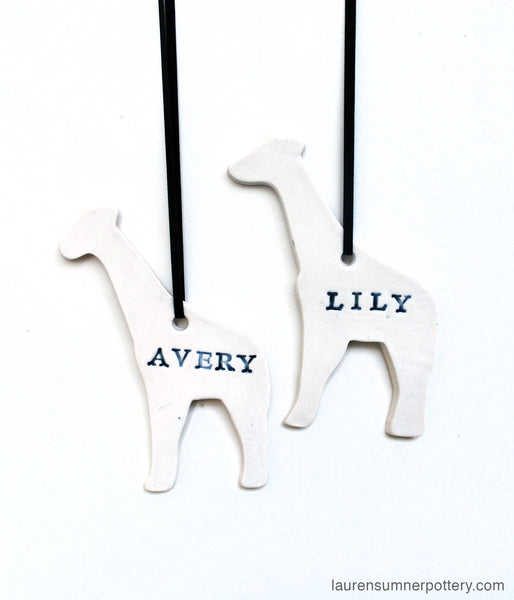 Giraffe Ornament, PersonalizedThis personalized porcelain giraffe ornament is a keepsake you will always treasure. Add a first name, last name, year or combination.