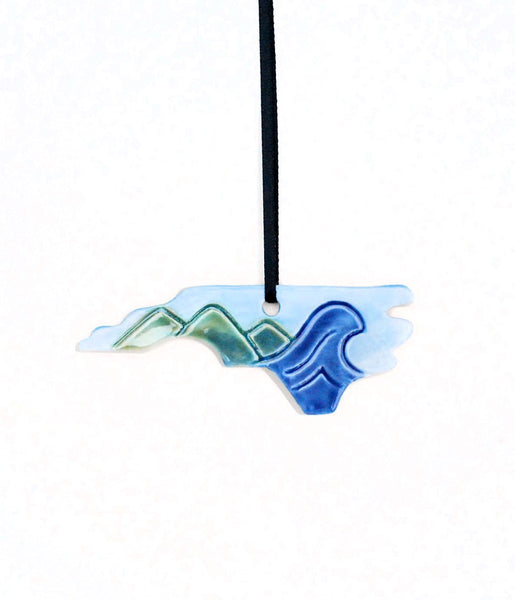 Mountain to the Sea State Ornament - Made to OrderA one-of-a-kind handmade ceramic ornament. All states, countries, provinces, islands are available. This handmade ceramic ornament is perfect for mountain and ocean 