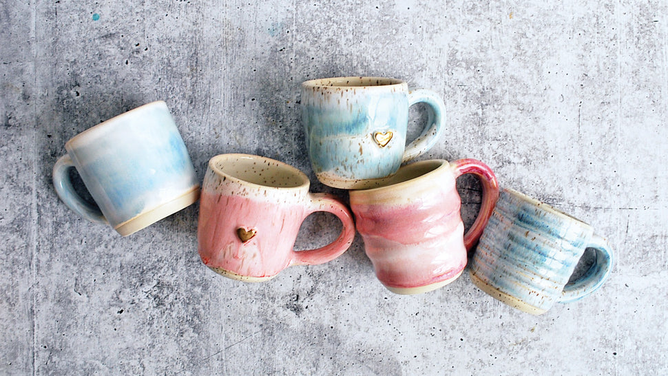image of five espresso mugs in blue and pink colirs