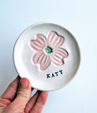 porcelain ring dish with pink dogwood stamped, with personalized name stamped in black
