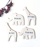 Giraffe Ornament, PersonalizedThis personalized porcelain giraffe ornament is a keepsake you will always treasure. Add a first name, last name, year or combination. Makes a great ornament for a c