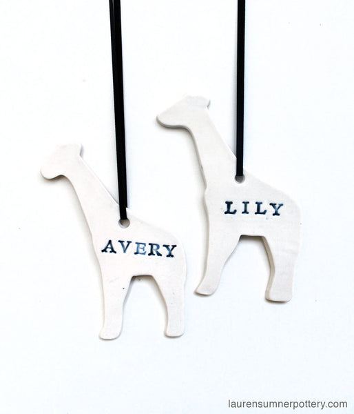 Giraffe Ornament, PersonalizedThis personalized porcelain giraffe ornament is a keepsake you will always treasure. Add a first name, last name, year or combination. 