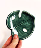 Forest Green Monstera Leaf Bowl - SmallMonstera Leaf Bowl :: Philodendron Leaf Dish :: Jewelry Storage :: Soap Dish :: Key Holder
This little leaf bowl is handmade with a cream-colored clay, and is glazed