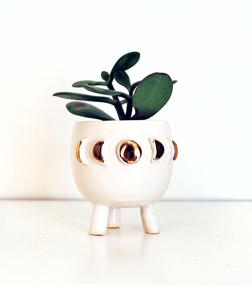 White Moon Phase Mini Planter - Air Plant Succulent PlantersA beautiful moon lovers planter! This little handmade ceramic planter has three feet. Glazed in glossy white, with 22k gold accents. Perfect for a tiny succulent or 