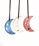 Crescent Moon OrnamentA pretty moon ornament to hang on your tree this year. This ornament has gold luster accents and can be glazed in the color of your choice. You can hang this ornamen