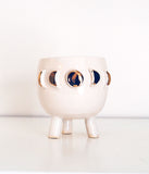 White Moon Phase Mini Planter - Air Plant Succulent PlantersA beautiful moon lovers planter! This little handmade ceramic planter has three feet. Glazed in glossy white, with 22k gold accents. Perfect for a tiny succulent or 