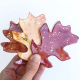 Oak Leaf OrnamentHandmade ceramic oak leaf ornament; I use a real oak leaf to create this one-of-a-kind ornament. Add metallic gold luster for a special shine on your tree.
:::::::::