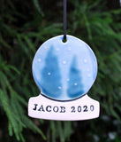 Snow Globe Ornament, PersonalizedThis personalized snow globe ornament is a keepsake you will always treasure. Add a first name, last name, year or combination. Makes a great ornament for a child, o