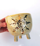 Yellow Planter with carved sun design, with gold details